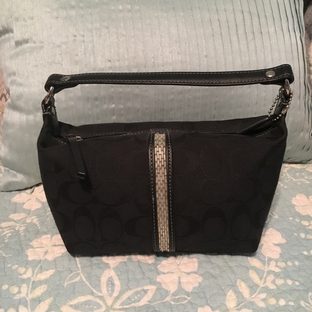 Coach rectangular shaped signature Jacquard purse.